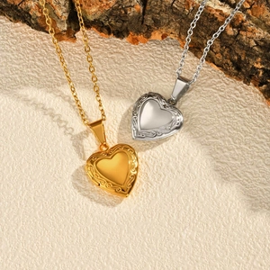Locket heart necklaces in gold and silver finish on natural bark aesthetic background