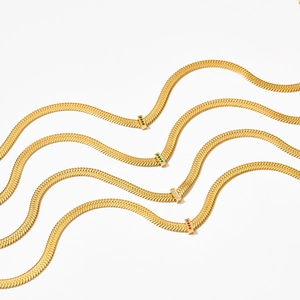 Flat gold snake chain necklaces with rectangle pendants in black, green, white, and red