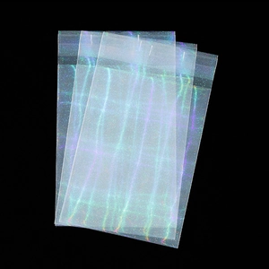 Macro shot of rectangular holographic laser self-sealing bags for jewelry packaging