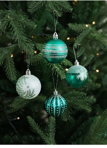 Detail of 6cm Christmas balls with glitter stripes, leaf patterns, and snowflakes
