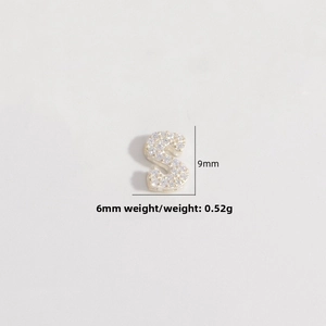 Detailed view of S-letter S925 silver pendant with micro-set cubic zirconia 9x6mm