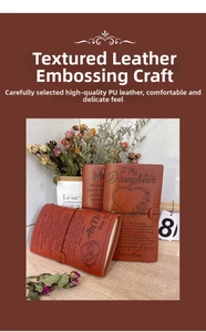 Close-up of A6 PU leather notebooks with embossed emotional messages for family