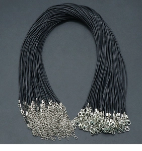 Detail of bulk black waxed cord necklaces with silver lobster clasps and extension chains