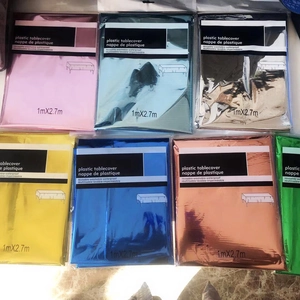 Seven packs of colorful metallic PET tablecloths including rose gold and silver