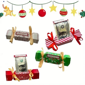 Detail of four Christmas money pull boxes with festive red and white patterns
