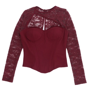Detailed flat lay of burgundy long sleeve lace corset top with sheer mesh texture