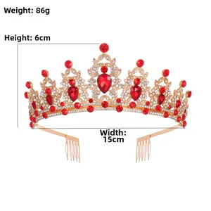 Detailed view of a gold crystal birthday queen crown with red rhinestones and hair combs