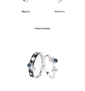 Detail of silver astronaut rings with star patterns and blue glitter rocket accents