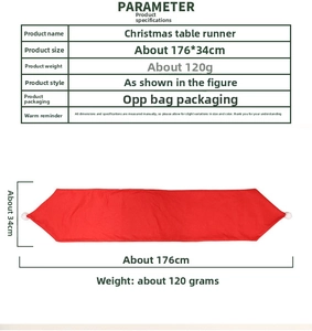 Christmas table runner in red fabric with white pom-poms measuring 176 by 34 cm