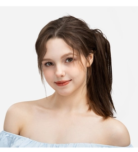 Close-up of high ponytail extension hair claw clip on female model with brown hair