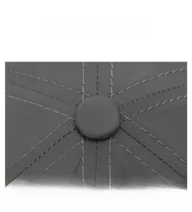 Detailed top view showing dark grey sun-shielding sports cap with precise stitching and button