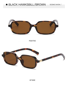 Detailansicht modischer quadratischer Schildpatt-Sonnenbrille mit braunen Gläsern Damen.