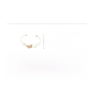Detail of copper cuff bracelet with pink zircon butterfly and inner diameter measurements