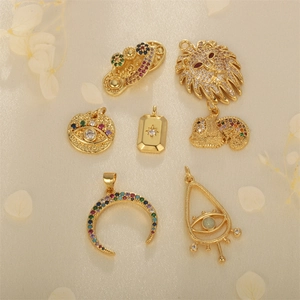 Assorted gold lizard moon and evil eye charms with colorful zircon for jewelry making