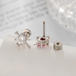 Silver cross stud earrings featuring heart-shaped zircon stones with screw backs