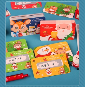 Macro detail of Christmas scratch-off reward cards with festive cartoon illustrations