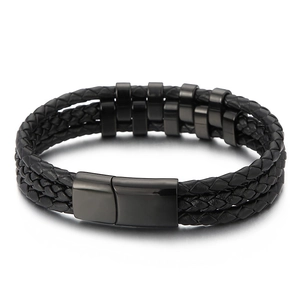 Men's multilayer black braided leather bracelet with magnetic metal clasp on grey background