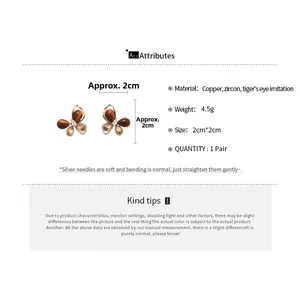Spécifications de taille et de matériau pour les boucles d'oreilles papillon oeil de tigre