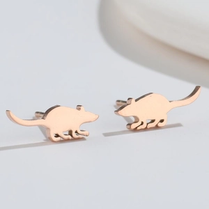 Close-up of rose gold mouse silhouette stud earrings with polished metallic finish