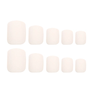 Set of 10 matte cream square press-on toenails neatly arranged on a white background