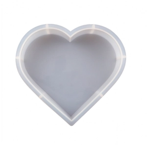 Close-up of heart-shaped silicone mold for DIY resin craft and specimen making