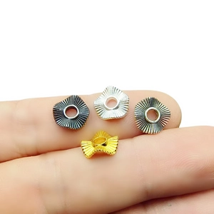 Irregular wavy metal spacer beads for DIY jewelry in gold, silver, and bronze colors