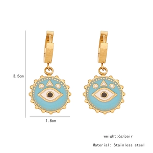 Detailed view of gold stainless steel evil eye drop earrings with dimensions and weight