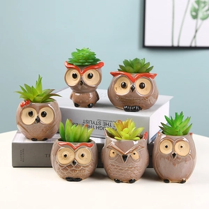 Set of 6 owl-shaped ceramic succulent pots on vintage books for home decor