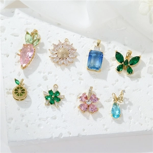 Set of 8 gold-plated butterfly and floral crystal pendants for DIY jewelry making