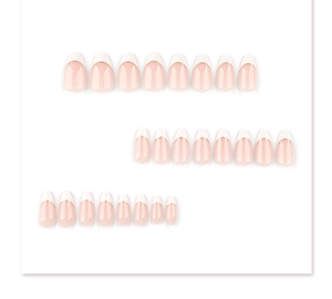 Short almond press-on nails with french white tips and elegant gold line detail