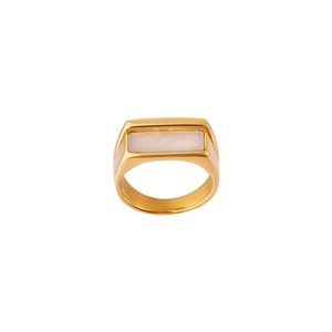 Detailed view of an 18k gold irregular ring featuring a rectangular white shell inlay