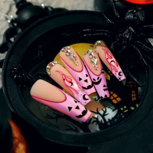 Pink Halloween coffin press on nails with pumpkin flame patterns and rhinestones