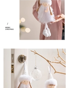 Detail of plush white and pink Christmas angel doll ornaments with knitted braids