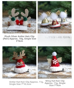 Detail view of four Christmas hair clips including reindeer antlers and Santa hats on snow