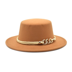 Close-up of caramel wool boater hat with stylish woven rope and gold chain detail