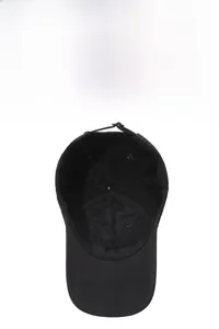 Detail view of the breathable mesh lining and adjustable strap on a black baseball cap