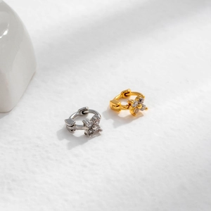 Minimalist clover stud earrings in gold and silver finish with sparkling gemstones
