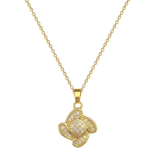 Gold titanium clover necklace with white rhinestones on clean white background