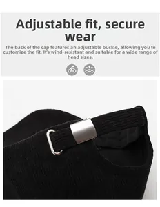 Détail d'une casquette en velours côtelé noir avec boucle et sangle en métal argenté