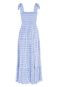 Detail of light blue tiered floral maxi dress with smocked bodice and tie-straps