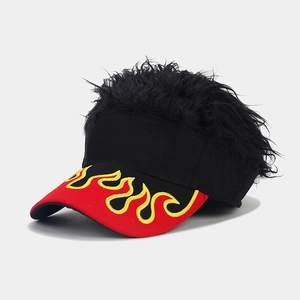 Detail of red flame embroidery and black synthetic wig hair on the visor baseball cap