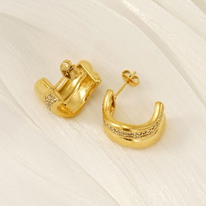 Elegant gold-plated C-shaped earrings with micro-inlaid rhinestones on white silk texture