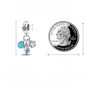 Macro detail of S925 silver ocean charm featuring shells and blue beads for DIY jewelry