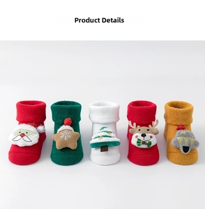 Detailed set of five cotton baby Christmas socks with 3D plush holiday character motifs