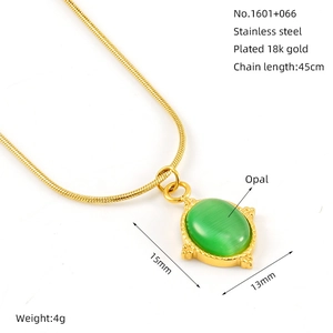 Detail of 18K gold plated stainless steel necklace with oval green cat eye stone pendant