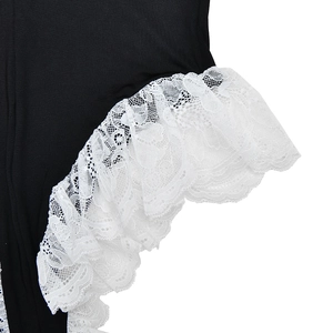 Close-up of elegant white lace trim detail on the black backless bodysuit fabric