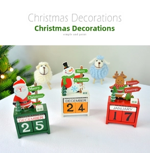 Detail view of colorful wooden Christmas countdown calendar blocks with Santa and Reindeer