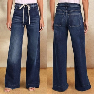 Detailed views of high waist dark blue wide leg jeans with adjustable white drawstring waist