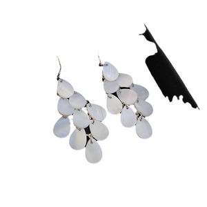 French vintage style earrings with triple teardrop layers and white pearl luster effect