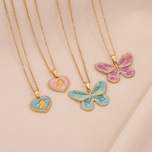 Retro stainless steel necklace set with vintage heart and butterfly pendants in gold finish